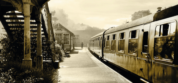 Old photograph of a train at a railway station